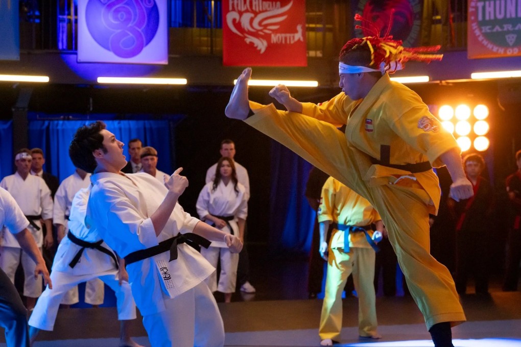Justin Ortiz (right) in a still from an episode of Cobra Kai season six. Ortiz and his wife have found success as stunt performers and actors, landing roles in Cobra Kai and more. Photo: Netflix