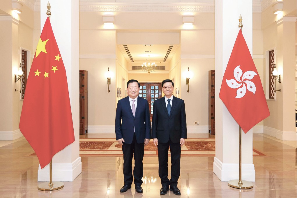 Xia Baolong (left) with Chief Executive John Lee at Government House. Photo: Handout