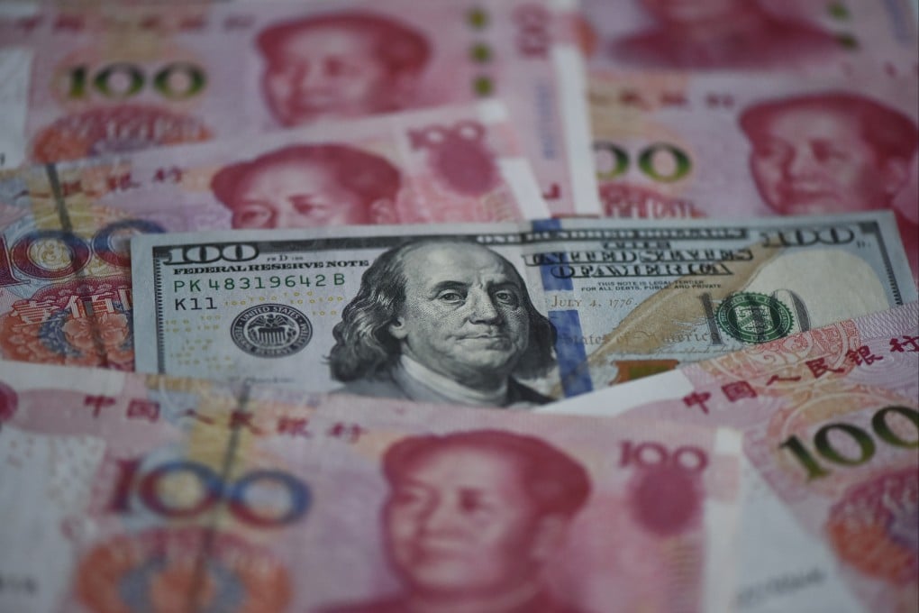 Photo shows US dollar and Chinese yuan banknotes in Fuyang city, East China’s Anhui province. Photo: CFOTO/Future Publishing via Getty Images