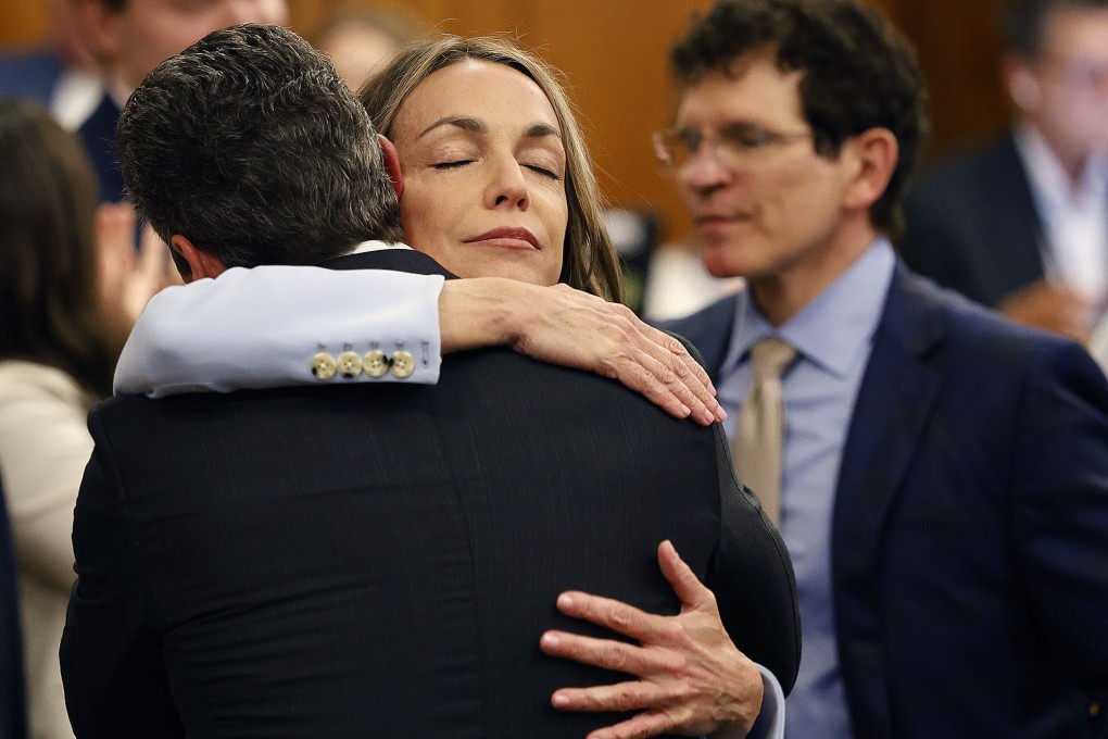 Karen Read hugs lawyer Alan Jackson after a not guilty verdict of was read in Norfolk Superior Court in Dedham, Massachusetts, on Wednesday. Photo: The Patriot Ledger via AP