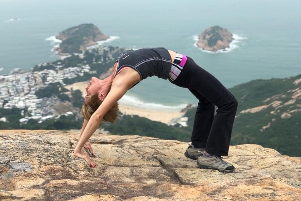 Susan Sims practises yoga on a hill in Hong Kong. On International Day of Yoga, Sims and fellow instructor Pushpa Thakurdas Vatvani describe how yoga shields them from typical ageing issues such as osteoporosis, heart problems, poor balance, anxiety and memory loss. Photo: Instagram/susansims8477
