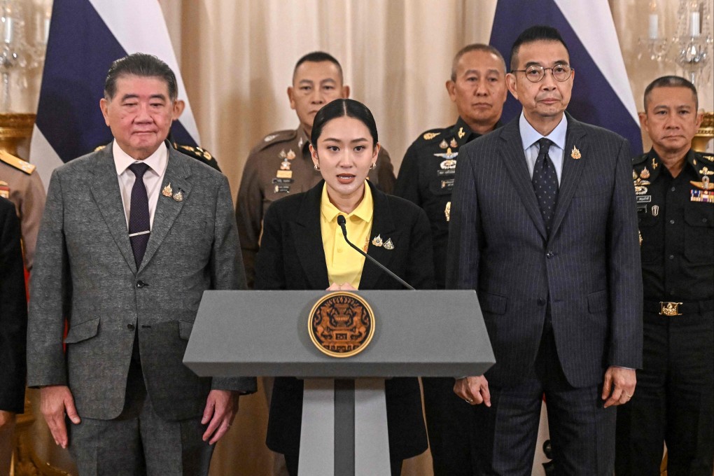 Thailand’s Prime Minister Paetongtarn Shinawatra (centre) speaks during a press conference in Bangkok on Thursday. Photo: AFP