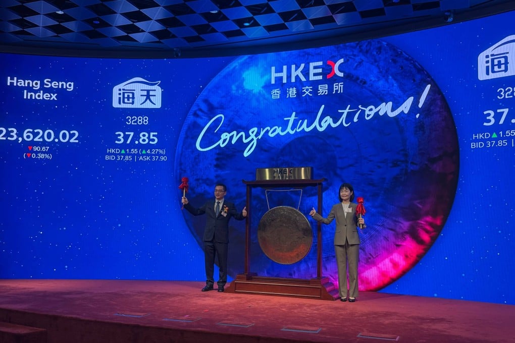 Cheng Xue (right), chairwoman of Foshan Haitian Flavouring & Food Company, after striking the ceremonial gong at the Connect Hall of the Hong Kong stock exchange to mark the trading of her company’s stock on June 19, 2025. Photo: Julie Zhang