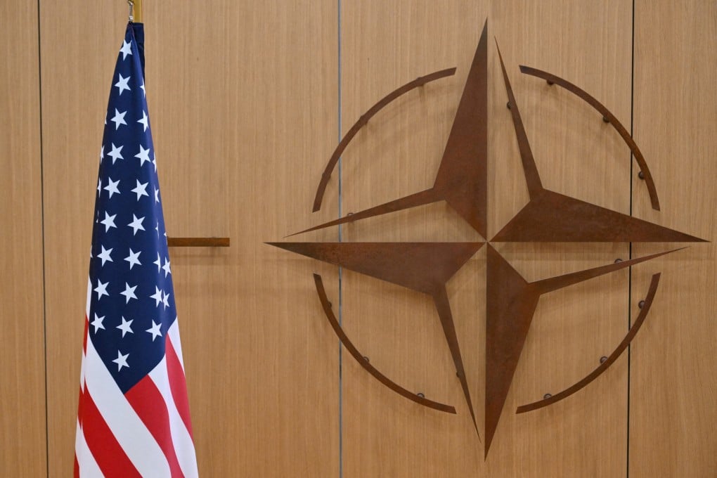 The US flag and the North Atlantic Treaty Organisation logo at Nato headquarters in Brussels. Photo: Reuters
