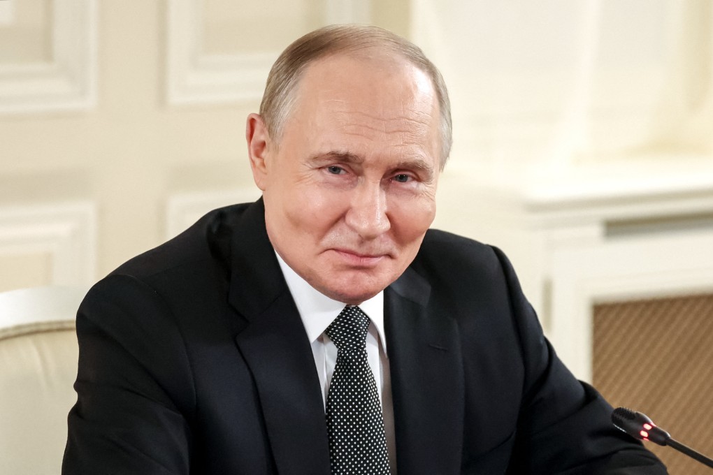 Russian President Vladimir Putin attends a meeting with representatives of international news agencies in St Petersburg on Wednesday. Photo: Sputnik via Reuters