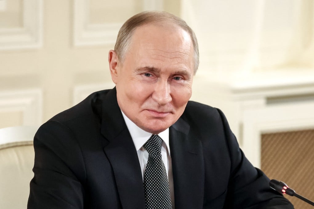 Russian President Vladimir Putin attends a meeting with representatives of international news agencies in St Petersburg on Wednesday. Photo: Sputnik via Reuters