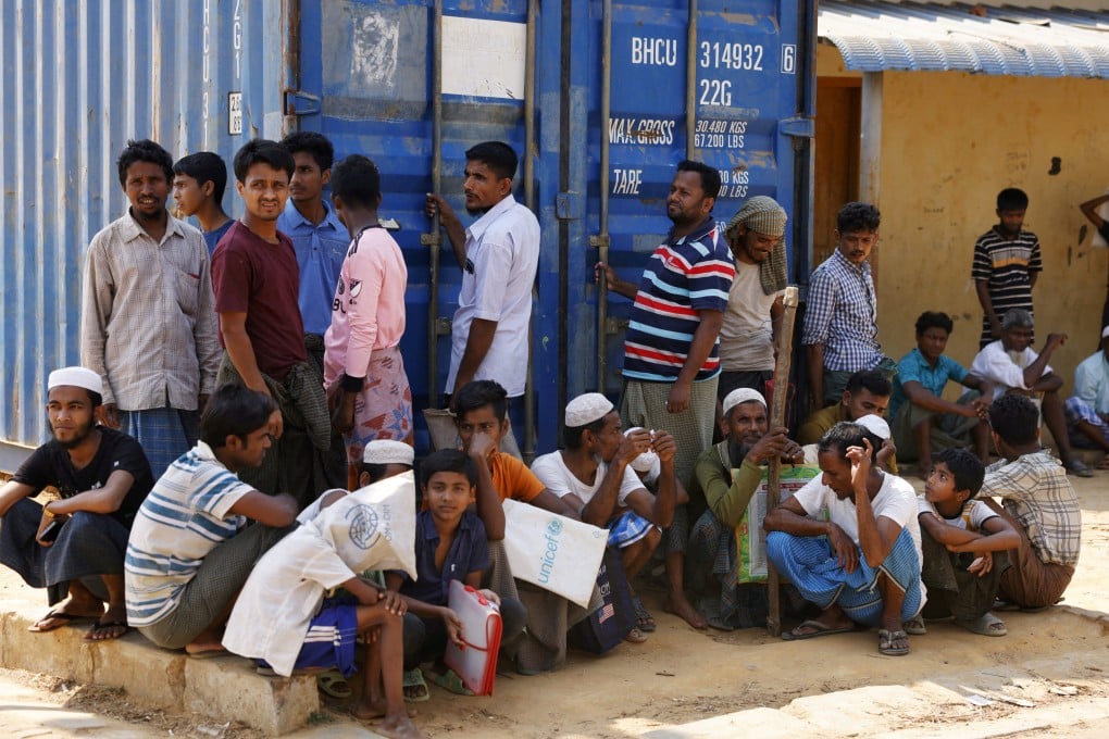 Rohingya refugees wait for relief supplies during Ramadan at the refugee camp in Cox’s Bazar, Bangladesh on March 16. Photo: Reuters