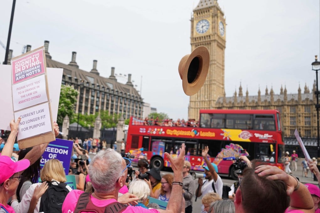 Campaigners for a change in the law on assisted dying celebrate outside The Palace of Westminster on Friday, after the vote to allow assisted dying for terminally ill people. Photo: AFP