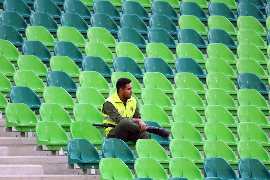 An Iranian soldier watches a Fifa World Cup 2026 qualification match between Iran and North Korea in Tehran, on June 10. Photo: EPA-EFE