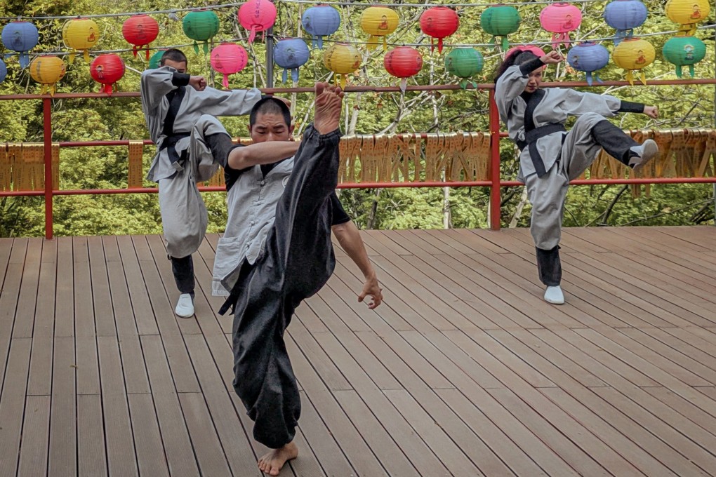 Master Hyunwoong (front) and volunteers give a Seonmudo demonstration at the Golgulsa Temple near Gyeongju, South Korea. Photo: Fiona Ching