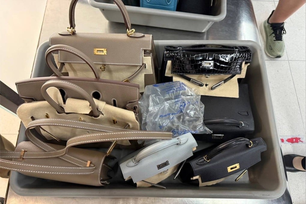 The suspect is alleged to have stolen 14 pre-owned Hermes bags and other items. Photo: Suvarnabhumi Immigration