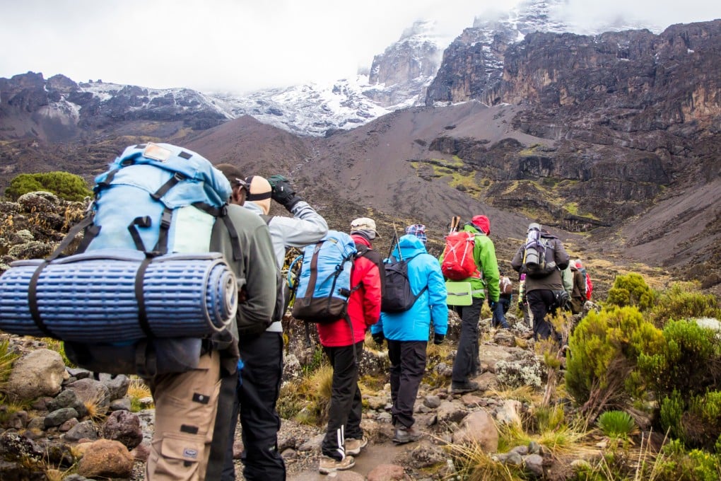 A group climbs Mount Kilimanjaro in Tanzania. Photo: Shutterstock