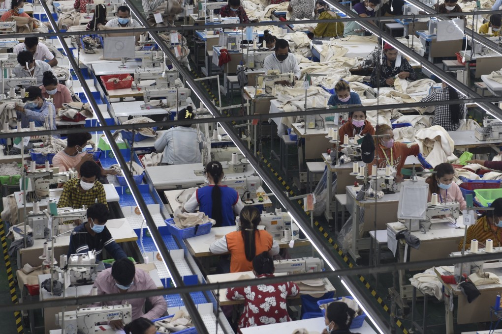 Garment workers make clothes at a factory in Phnom Penh, Cambodia, on December 17, 2021. Photo: Xinhua