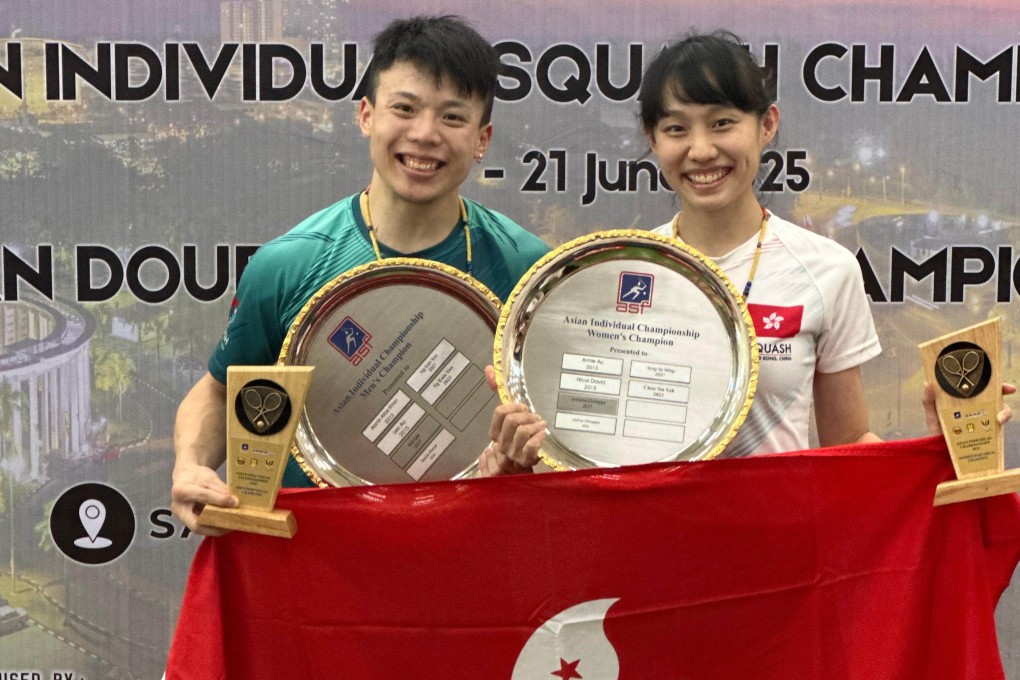 Alex Lau (left) and Tomato Ho are all smiles after triumphing in the men’s and women’s sections. Photo: Squash Association of Hong Kong, China