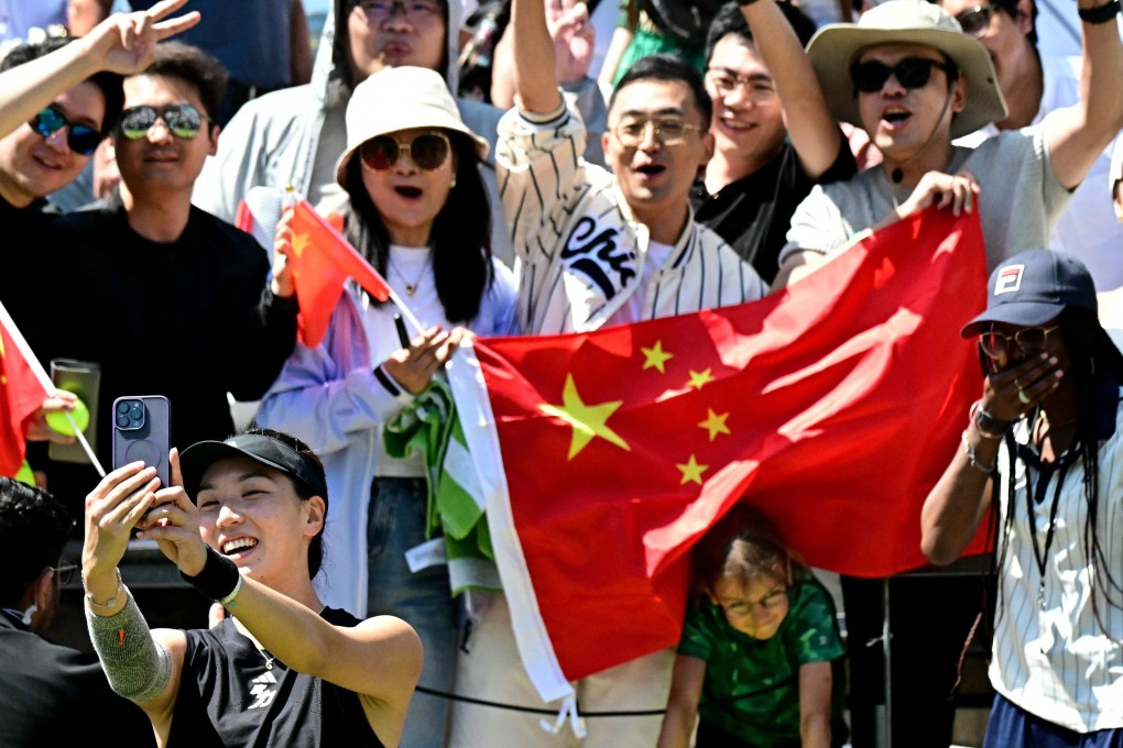 China’s Xinyu Wang poses for a selfie with fans after victory over Spain’s Paula Badosa in their quarter-final matchup at the Berlin Open. Photo: AFP
