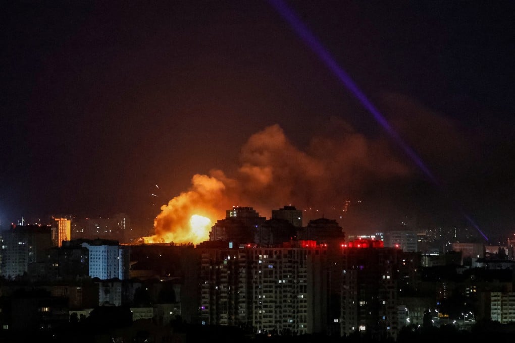 An explosion lights up the sky over Kyiv during a Russian drone strike on Tuesday. Photo: Reuters