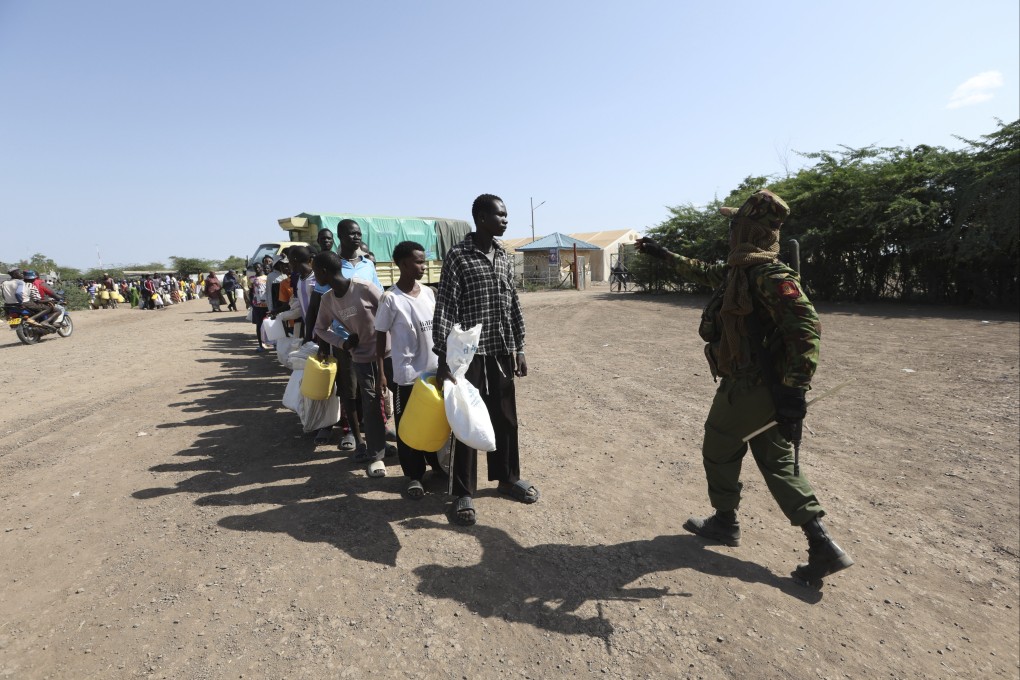 Refugees waiting in a queue to receive humanitarian aid distributed by the World Food Programme (WFP) at Kakuma Refugee Camp in Turkana, Kenya, on June 4. Photo: AP