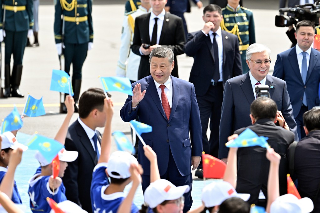 Chinese President Xi Jinping, with Kazakh President Kassym-Jomart Tokayev, greets a crowd in Astana, Kazakhstan, after arriving to attend the second China-Central Asia Summit on June 16. Photo: Xinhua