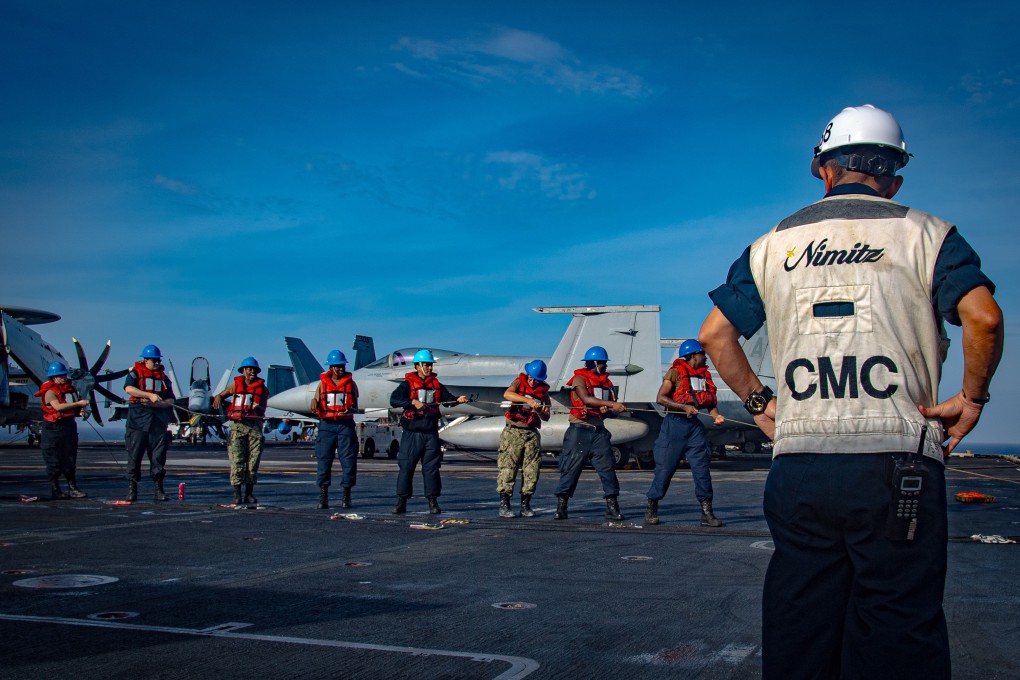 The aircraft carrier USS Nimitz cancelled a planned port call in Vietnam to support the USS Carl Vinson carrier strike group in the Middle East. Photo: Handout