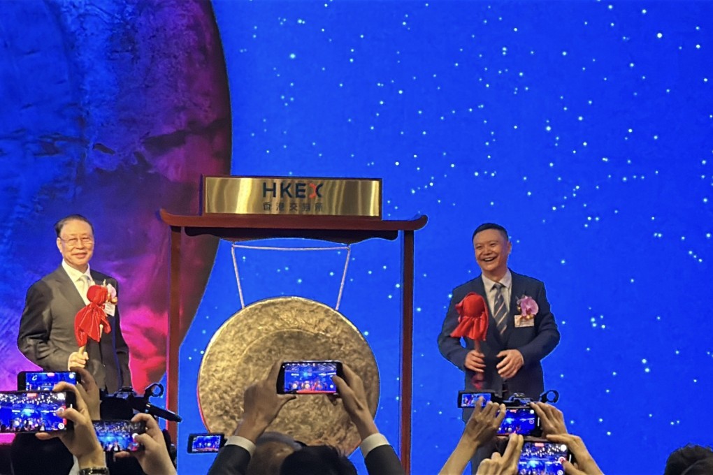 Zhang Daocai (centre), the founder of Zhejiang Sanhua Intelligent Controls, and the chairman Zhang Yabo (right) at the company’s trading debut on the Hong Kong stock exchange on June 23, 2025. Photo: Aileen Chuang