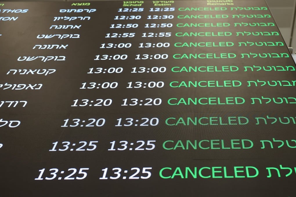 A flight status display shows affected flights at Ben Gurion Airport in Isreal. Almost 5 per cent of international flights to the Middle East have been cancelled this month due to the escalating conflict in the region. Photo: EPA-EFE