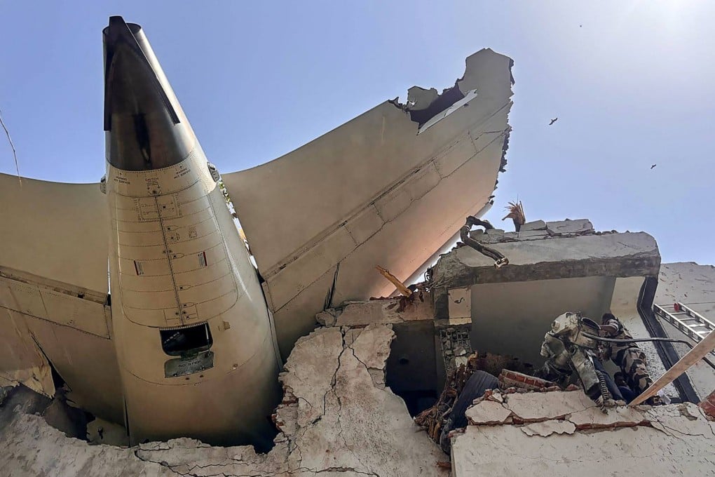 The rear of an Air India plane is seen after it crashed into residential buildings in Ahmedabad shortly after take-off on June 12. Photo: Central Industrial Security Force / AFP