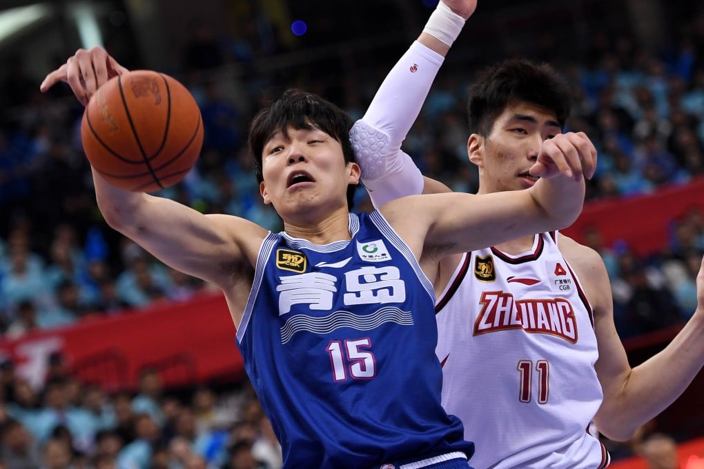 Yang Hansen (left) in action for Qingdao in China’s CBA play-offs in April. Photo: Xinhua
