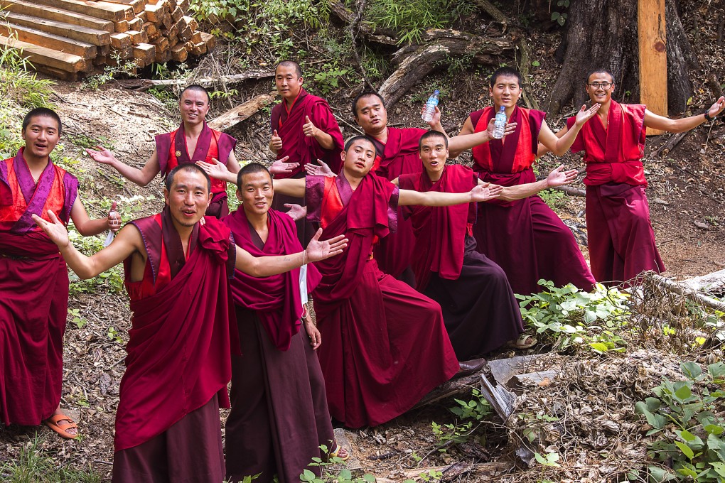 Buddhist monks take a hike in Bhutan in September 2022. Photo: Tim Pile