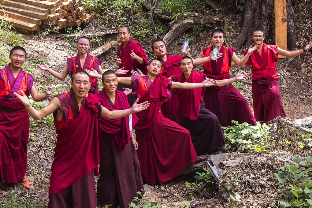 Buddhist monks take a hike in Bhutan in September 2022. Photo: Tim Pile