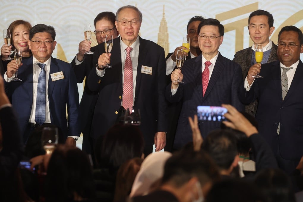Gan Khai Choon (front row, second left), the chairman of the Malaysian Chamber of Commerce in Hong Kong, Chief Executive John Lee Ka-chiu (front row, second right) and Malaysian ambassador Norman Bin Muhamad attend an event at the JW Marriott last year. Photo: Edmond So