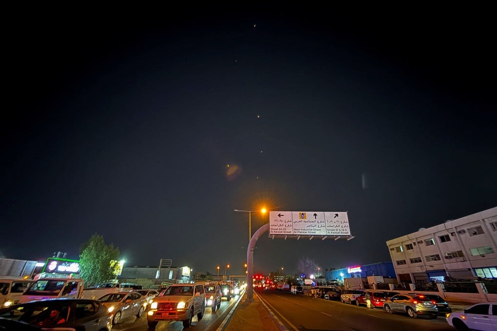 Traces are seen in the sky after Iran’s armed forces say they targeted a US airbase in Qatar on Monday. Photo: Reuters