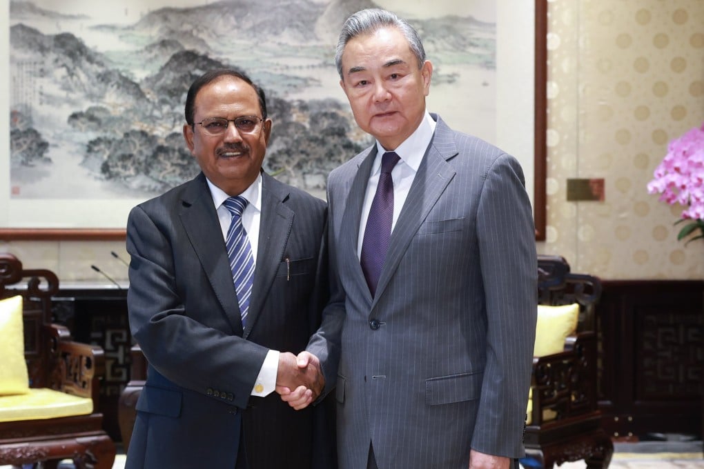 Indian national security adviser Ajit Doval and Chinese Foreign Minister Wang Yi in Beijing on Monday. Photo: EPA