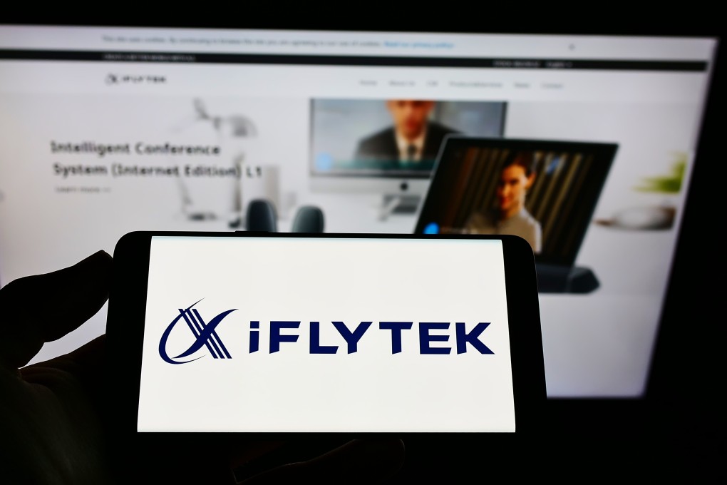 A smartphone displays the iFlytek logo in front of the company’s web page. Photo: Shutterstock Images