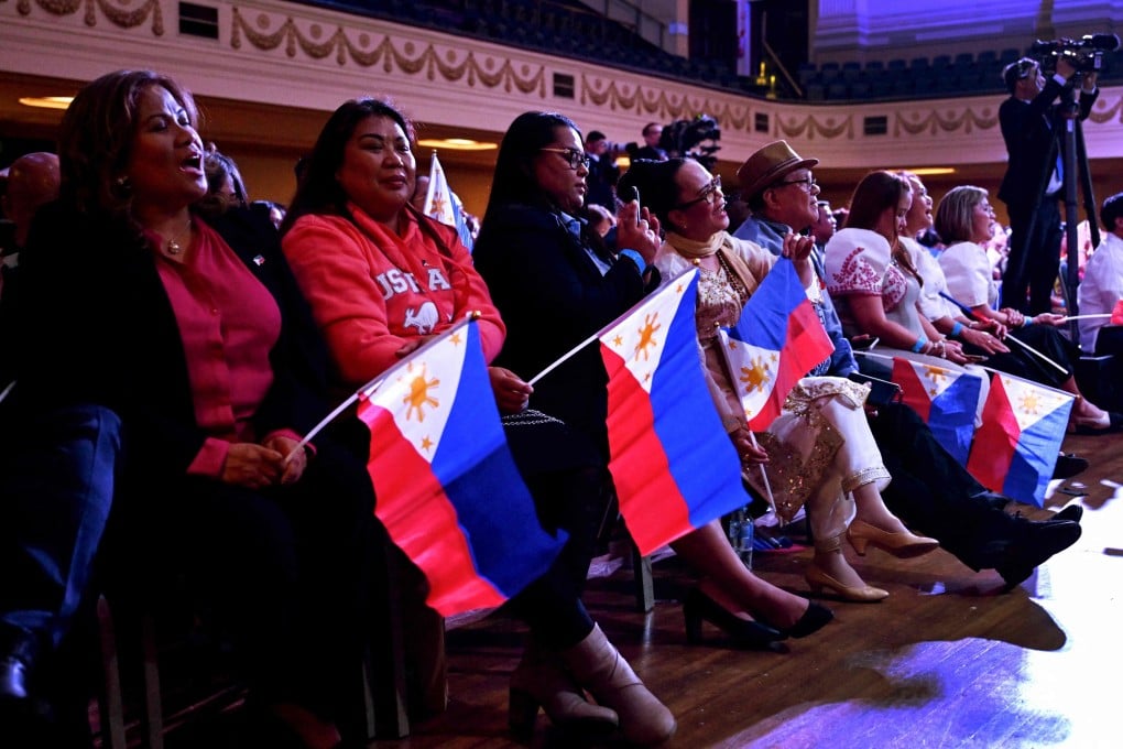 Filipinos in Australia listen to Philippine President Ferdinand Marcos Jnr during an event in Melbourne last year. Photo: AFP