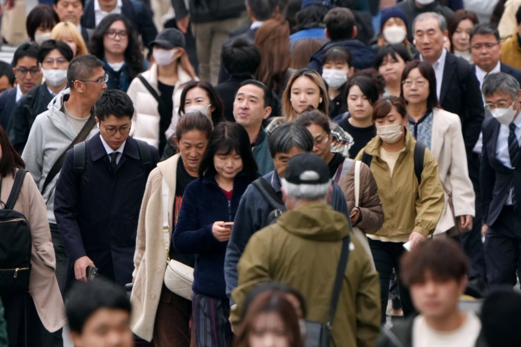 Pedestrians cross a road in Tokyo. Only two countries – France and Turkey – reported a higher share of respondents believing their nation is in decline. Photo: EPA-EFE