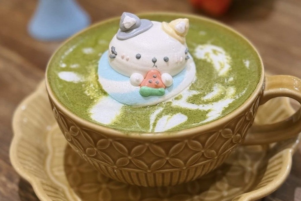 An adorable edible cat made from royal icing is delicately placed on top of coffee and other speciality drinks at Relieve, a cafe in Sheung Wan, Hong Kong. Photo: Instagram/relieve.hk