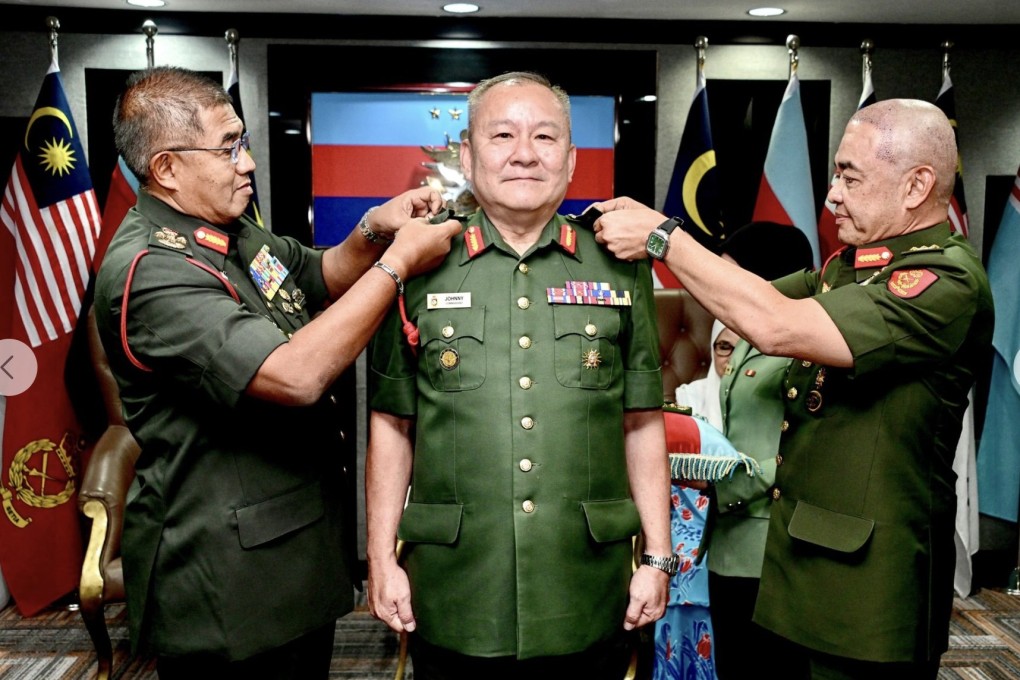 Lieutenant General Johnny Lim Eng Seng (centre) receives his stars from Armed Forces chief General Mohd Nizam Jaffar (left) and Army Chief General Muhammad Hafizuddeain Jantan. Photo: Facebook/Malaysian Armed Forces