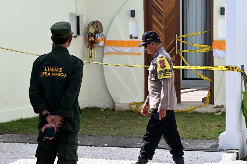 A police officer outside a villa in Munggu village, Badung regency, on Indonesia’s resort island of Bali, where Australian national Zivan Radmanovic, 32, was shot dead and another man, 34-year-old Sanar Ghanim, was seriously wounded on June 14, 2025. Authorities said they were pursuing three Australian suspects in connection with the attack. Photo: AFP