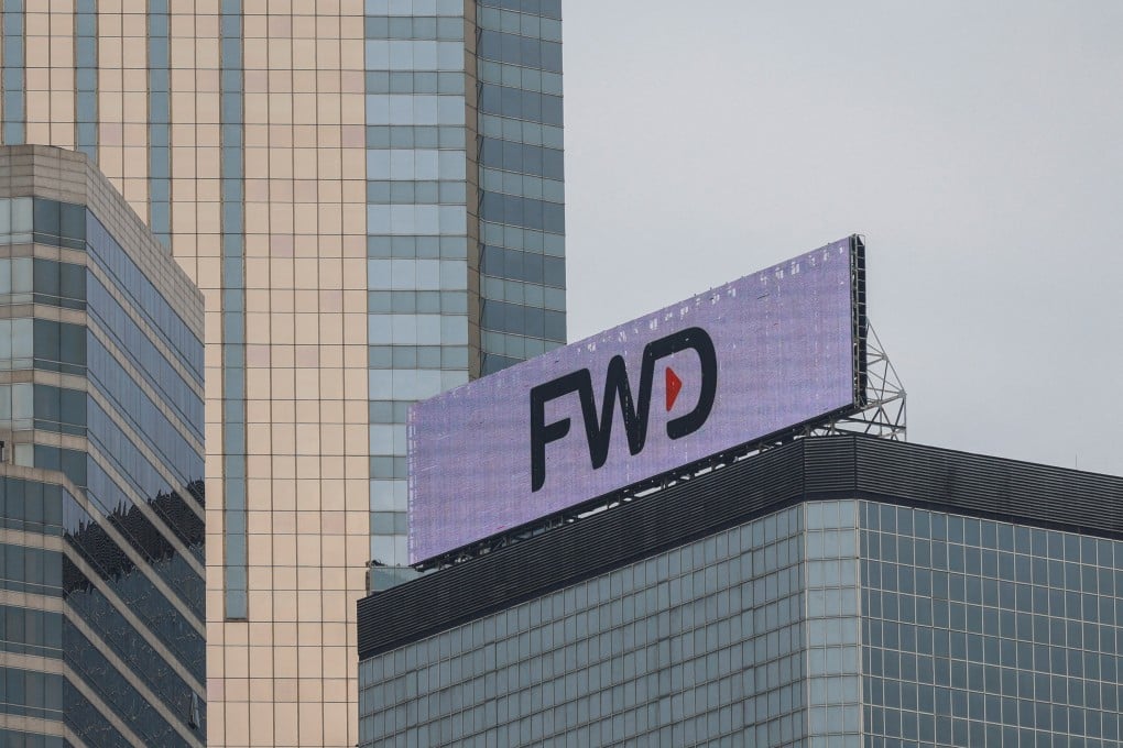 FWD’s corporate logo atop its main building in Hong Kong. Photo: Reuters