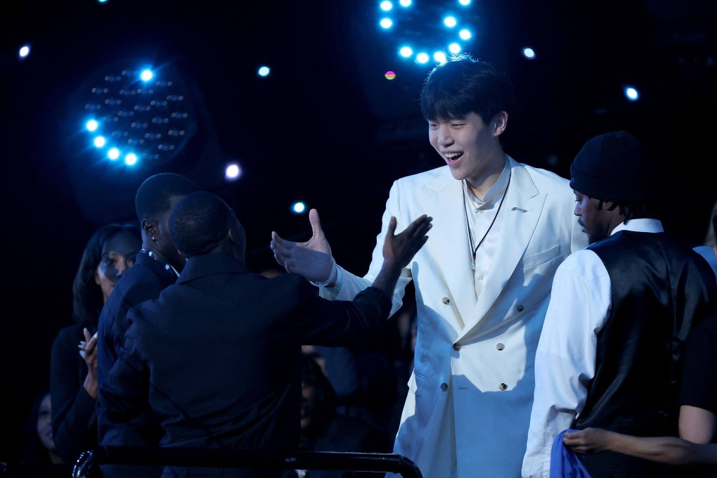 Yang Hansen reacts to being picked during the NBA draft in New York City on Wednesday. Photo: Getty Images via AFP