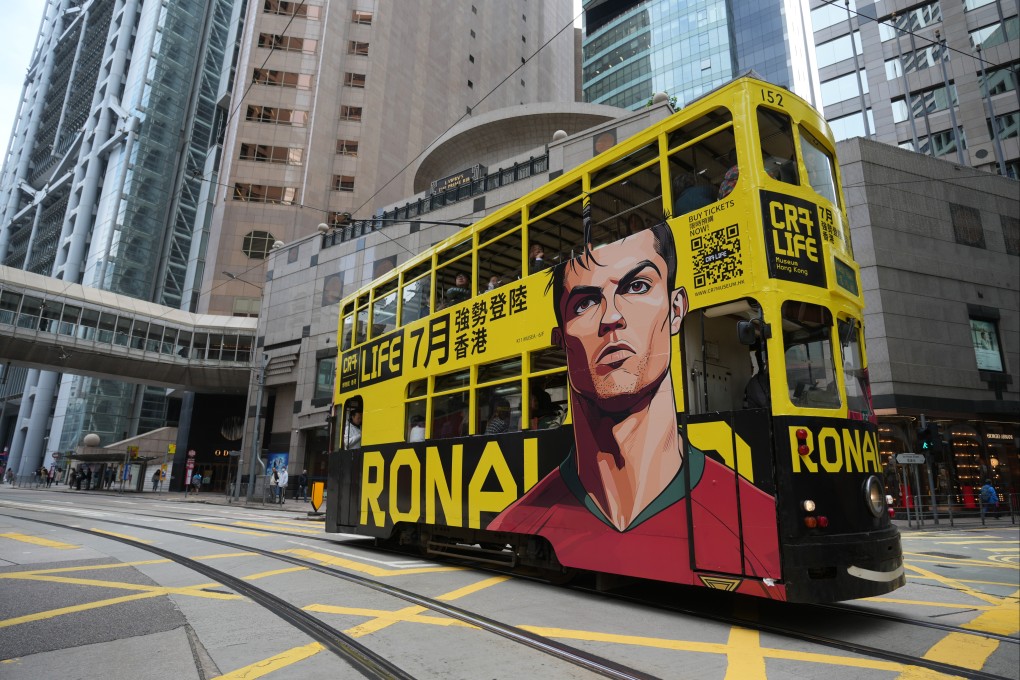 A tram advertising Cristiano Ronaldo’s museum passes through Hong Kong. Photo: Sam Tsang
