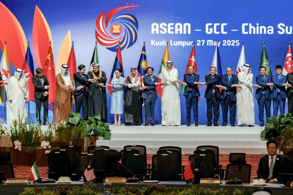 Leaders of the Association of Southeast Asian Nations, Gulf Cooperation Council and China join hands for a group photo as they meet for a summit in Kuala Lumpur, Malaysia, on May 27. Photo: Kyodo