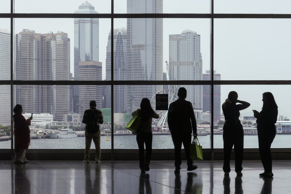 People look at the Hong Kong skyline from the Convention and Exhibition Centre in Wan Chai on April 6. Photo: Jonathan Wong