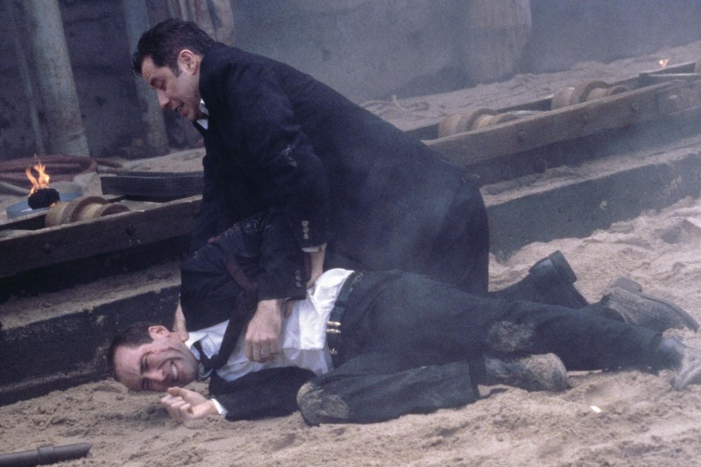 John Travolta (top) and Nicolas Cage in a still from John Woo’s 1997 film  Face/Off.