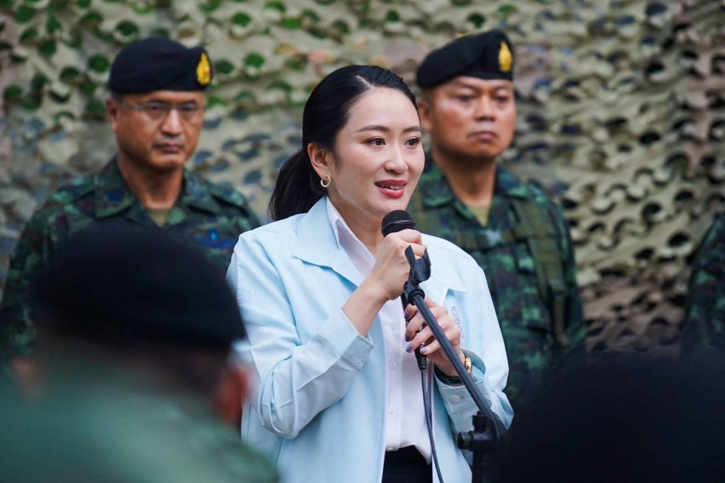 Thailand’s Prime Minister Paetongtarn Shinawatra (centre) speaks to troops during a visit to the Royal Thai Army’s Morakot Operations Base in Ubon Ratchathani province on June 20. Photo: AFP