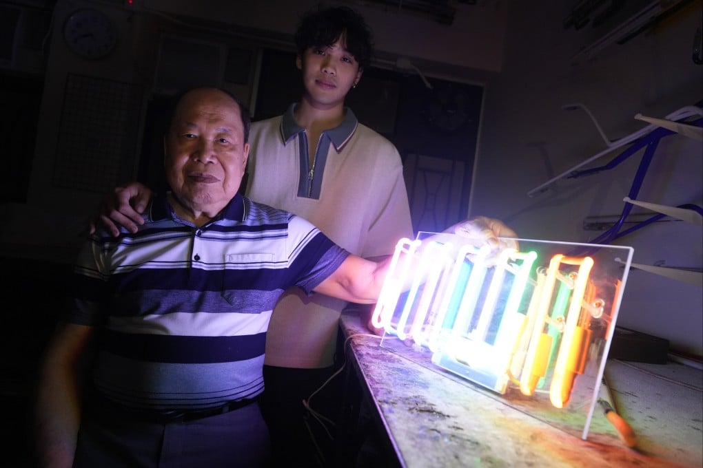 Neon master Wong Kin-wah (left) and his grandson, artist Jerry Loo, in Wong’s studio in Mong Kok, Hong Kong. Loo says the pair’s new exhibition at PMQ “is not just about neon light, it’s about legacy”. Photo: Sun Yeung