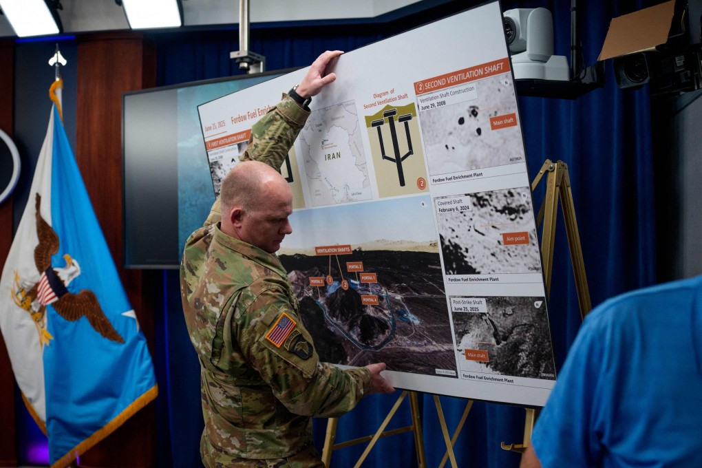 A poster showing US assessments of damage to Iran’s Fordow nuclear facility is removed following a Pentagon news conference on Thursday. Photo: AFP