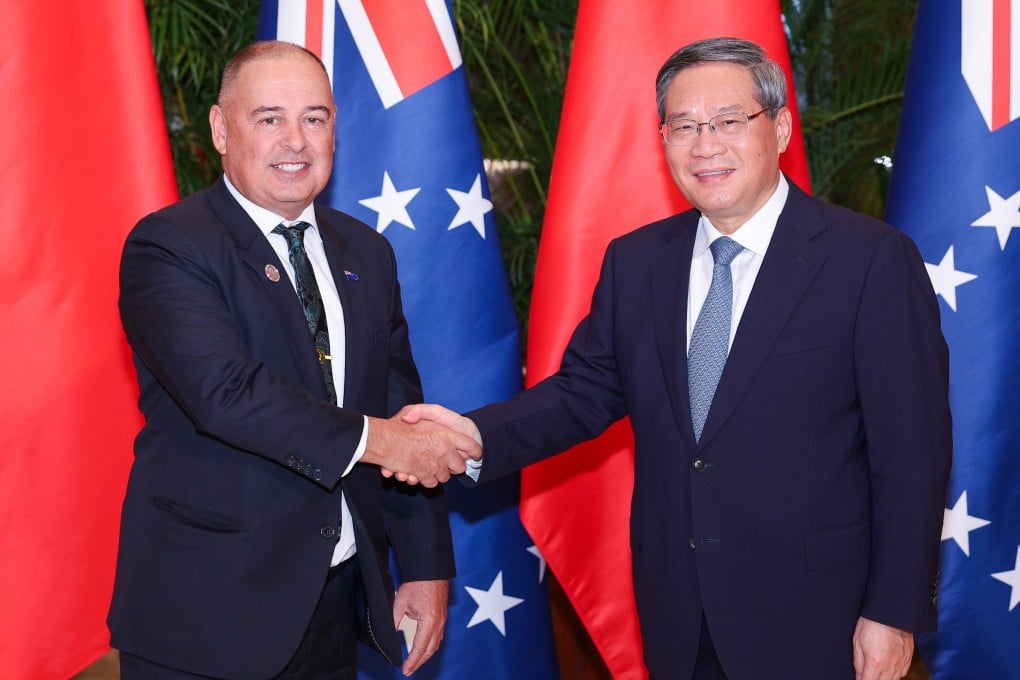 Chinese Premier Li Qiang shakes hands with Cook Islands Prime Minister Mark Brown in February. Photo: Xinhua