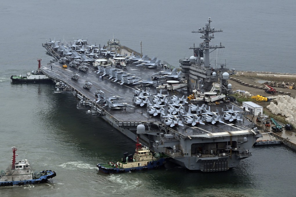 The US Theodore Roosevelt aircraft carrier anchored in Busan, South Korea, in June last year. Photo: AP
