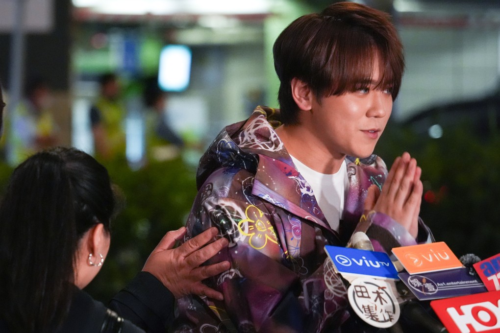 Pop star Keung To speaks to the media at Hong Kong International Airport ahead of a trip to France earlier this week. Photo: Eugene Lee